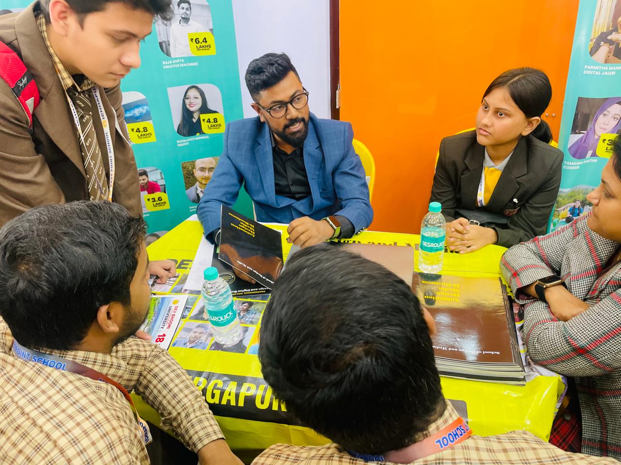 Mentor reviewing programs with a prospective student