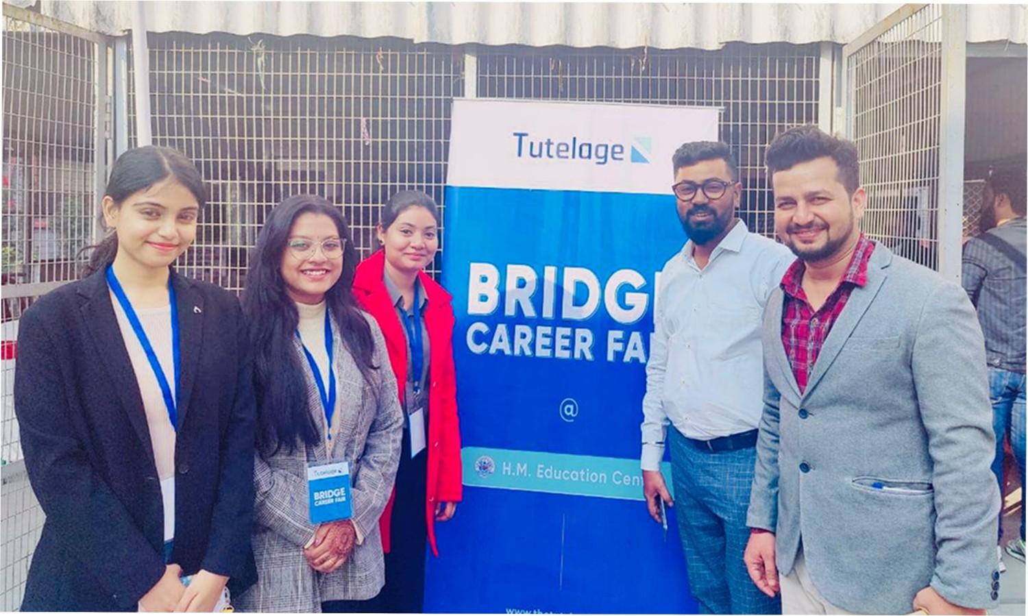 Students exploring booths at Bridge Fair by Tutelage