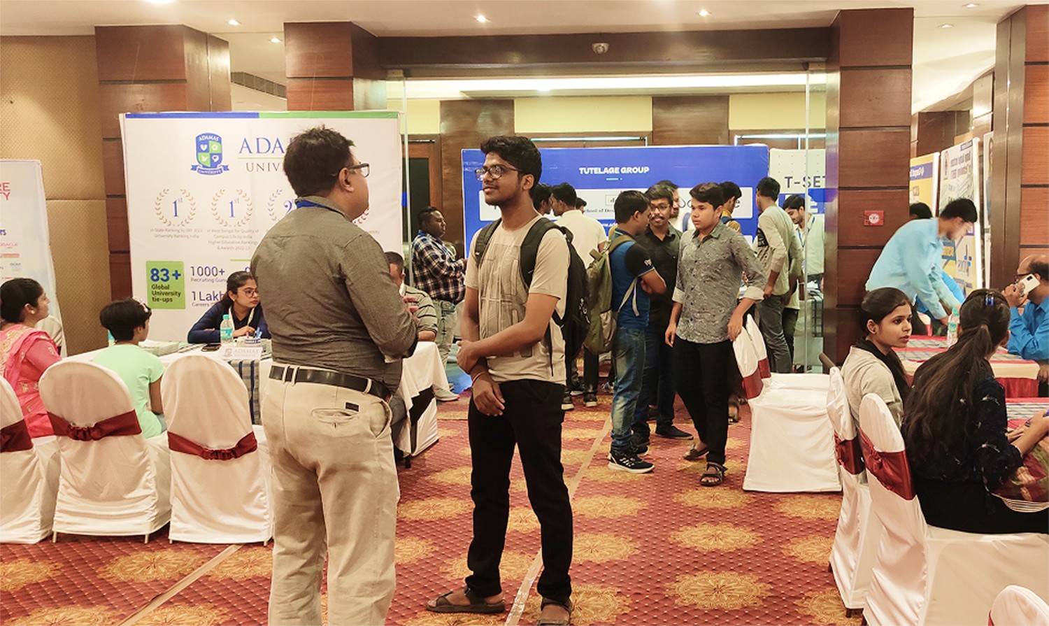 Mentor reviewing programs with a prospective student