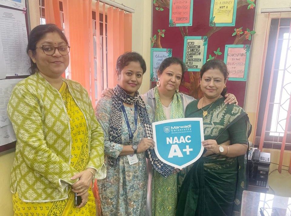 Wide shot of exhibition hall with colorful college booths