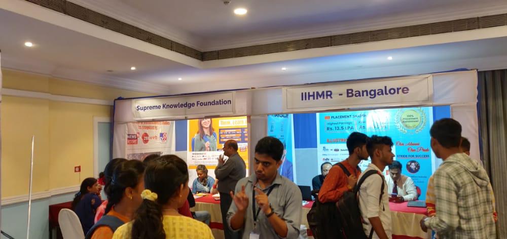 Mentor reviewing programs with a prospective student